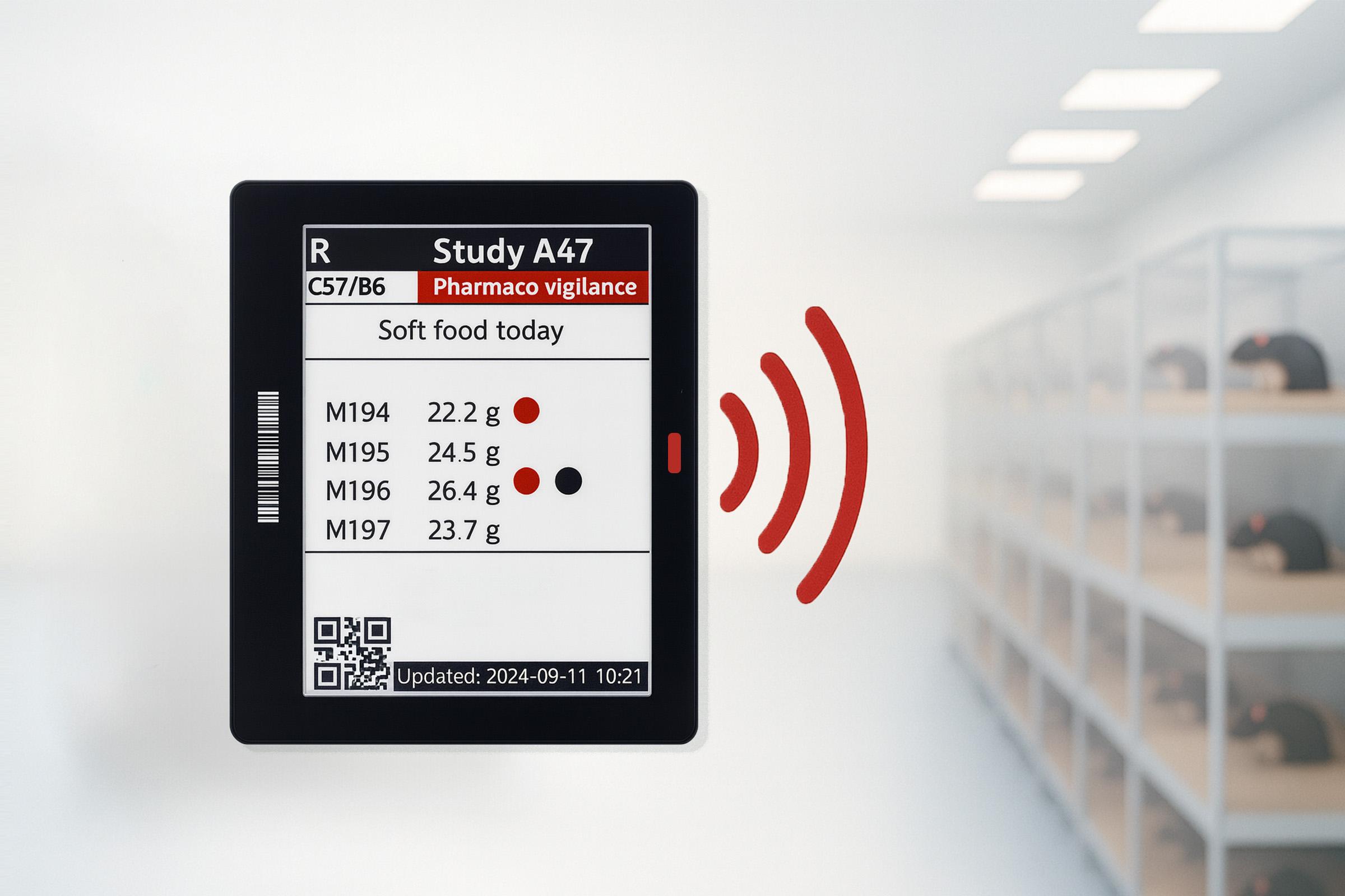 Digital cage card with LED indicator providing visual alerts in an animal research facility